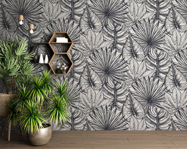 Tejido botánico en blanco y negro: un mosaico de hojas tropicales